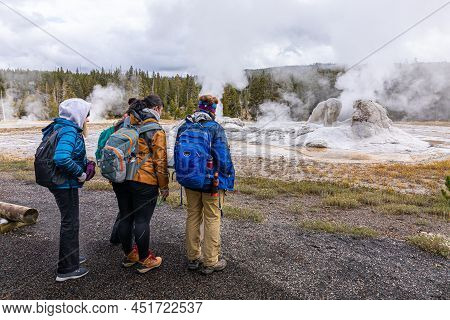 Wyoming, Usa - October 1, 2019: Group Of Tourist On Hot Zone Inside Yellowstone National Park To Wat