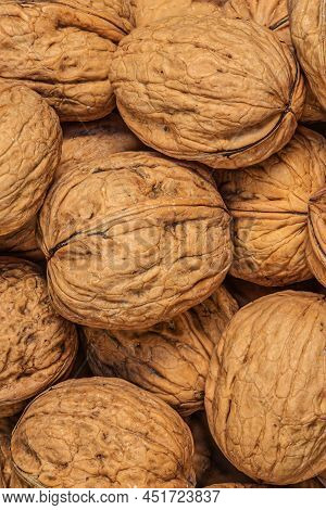 Ripe Walnuts Wallpaper.  Walnut Fresh Nuts Background Top View
