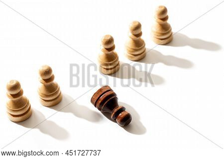 One Black Chess Pawn Among Whites. Concept Of Racism And Discrimination.