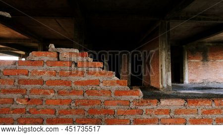Close-up Of The Rubble Of An Industrial Building Collapsing Into A Pile Of Concrete And Brick. And T
