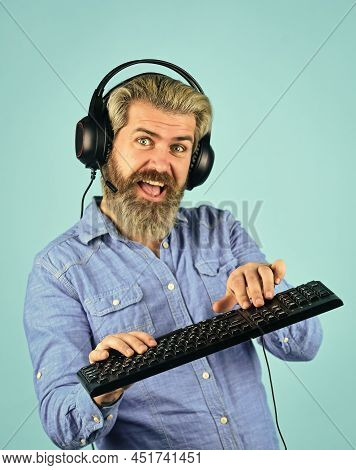 Works At Laptop. Professional Gamer Playing Computer Game. Chat Online. Online Video Game. Cyber Cha