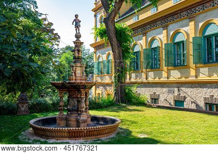 Decorated Fountain With A Boy In Pecs Hungary