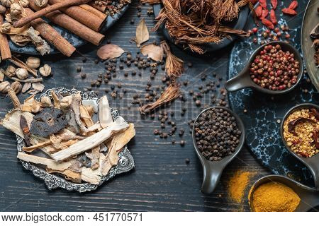 Food And Ingredent Concept. Closeup Of Spoon Of Black Pepper, Curcuma Powder, Dry Chili, Cinnamon, M
