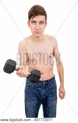 Weak Young Man In Hold A Heavy Dumbbell Isolated On The White Background