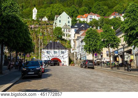 Bergen, Norway - 27 May 2018: Entrance To The Floibanen Cable Car. A White Building On A Green Hill 