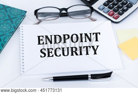 Endpoint Security Text On Notepad And Yellow Background. Business Concept