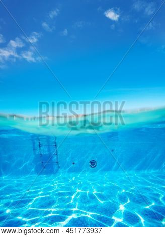 Split Underwater Pool Photo Of Rails And Ladder Stairs