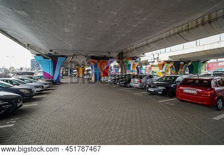 Bucharest, Romania - March 17, 2022: Cars Parked In The Parking Lot Under The Basarab Bridge, The Lo
