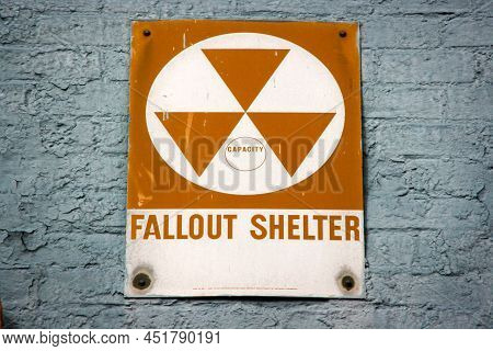 Nuclear Radiation Fallout Shelter Sign On A Grey Wall