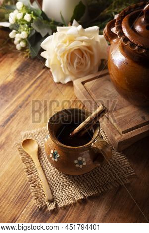 Authentic Homemade Mexican Coffee (cafe De Olla) Served In Traditional Clay Mug (jarrito De Barro) O