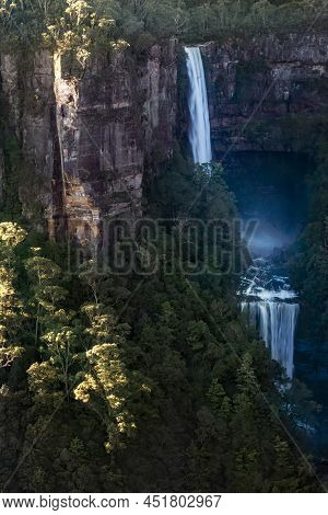 Distant Views Across The Deep Chasm To  Two Cliff Drops Of Belmore Falls Waterfall In The Southern H