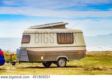 Caravan Trailer Camping On Seashore. Capicorb, Valencia Region Spain. Vacation With Mobile Home.