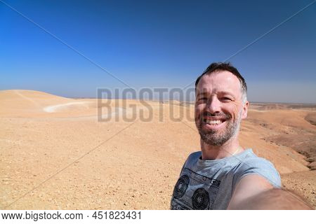 Tourist Selfie In Agafay Desert Landscape Near Marrakech, Morocco.