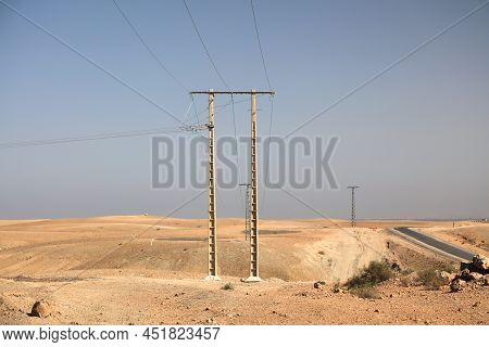 Electric Grid In Agafay Desert Landscape Near Marrakech, Morocco.