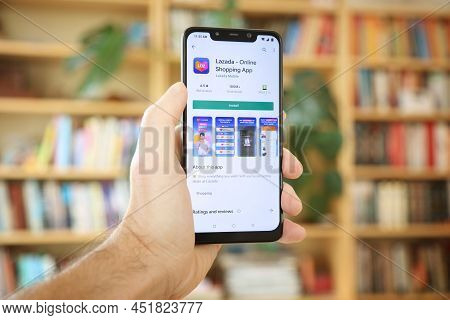 Warsaw, Poland - January 29, 2021: User Installing Lazada Online Shopping Mobile App On An Android O