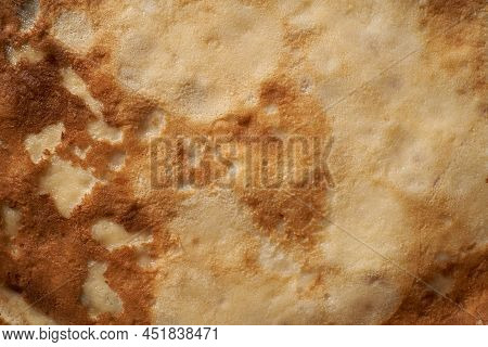 Texture Of A Cooked Thin Pancake Closeup. Fried Pancakes.