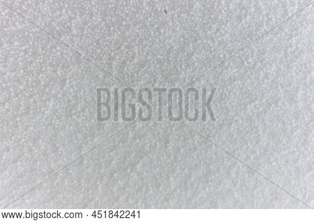 Close Up Of Graupel Snow Pellets, Formed When Supercooled Water Droplets Freeze Onto Snow Crystals