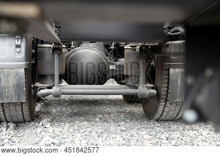 Tandem Rear Axle Housing Is Under The 6 Wheel Medium Duty Truck.