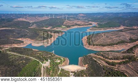 Aerial. Photo From Sky, Dams Filled With Water Bravura Portimao. In Background, A Park Of Wind Gener