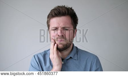 Caucasian Man Suffering Tooth Pain. Pulpitis, Caries Concept