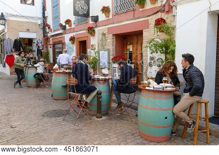 Cordova, Spain - 10 January 2022: People Eating On A Restaurant Of Cordova In Spain