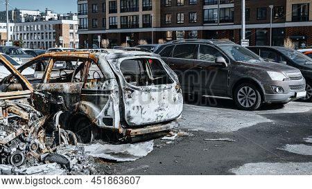 Burned And Unharmed Car. One Auto Was Destroyed By Fire. Arson Of A Vehicle. Rusty Pile Of Metal. Ca