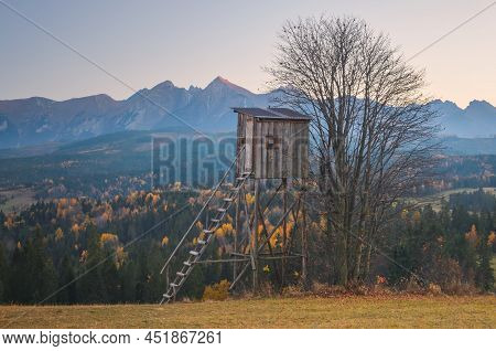 Autumn Mountain Landscape In The Countryside. View With A Charming Wooden Hut In The Village Of Laps