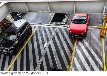 Los Cristianos, Spain - August 9, 2021: Vehicles Boarding The Ferry In Los Cristianos Harbour. Roro 