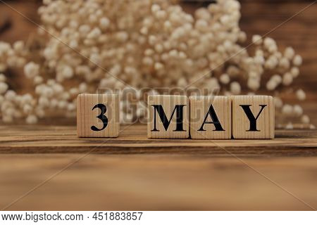 May 3, Calendar Cover Design With Number Cube With Green Fruit On Blue Background. High Quality Phot