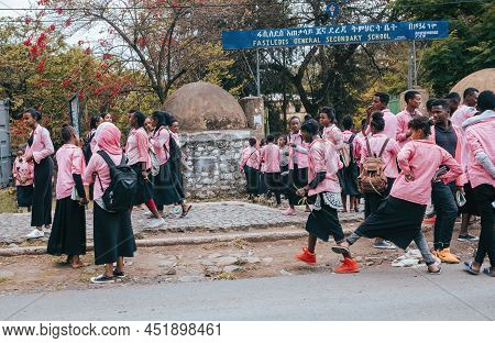 Gondar, Ethiopia, April 22.2019, Ethiopian Students In Uniform Behind Fasiledes Secondary School In 