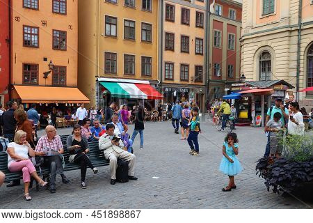 Stockholm, Sweden - August 23, 2018: People Visit Stortorget Square In Gamla Stan (old Town) In Stoc