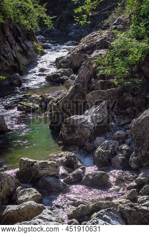 Mountain River In The Gorge Of Mountains Near The City Of San Pelegrino In Italy