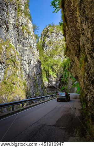 Mountain Road In The Gorge Of The Mountains Near The City In Italy San Pelegrino