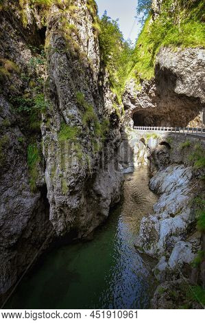 Mountain Road In The Gorge Of The Mountains Near The City In Italy San Pelegrino