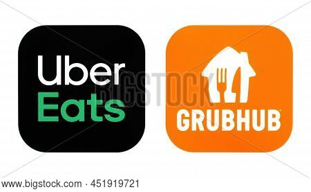 Kiev, Ukraine - February 08, 2022: Set Of Popular Food Apps Icons, Printed On Paper: Uber Eats And G