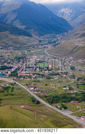 Mountain Landscape With A City At The Bottom Of The Gorge. Upper Fiagdon In North Ossetia.