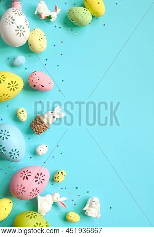 Easter Composition. Easter Eggs And Easter Bunny On Pastel Blue Background. Minimal Concept Of Easte