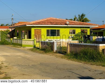 Kralendijk Bonaire - October 6, 2013: Brightly Colored Green Residential Tropical Home