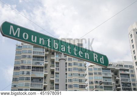 Singapore- Mar 26, 2020: Mountbatten Road Sign With High Rise Condominium As Background. Mountbatten