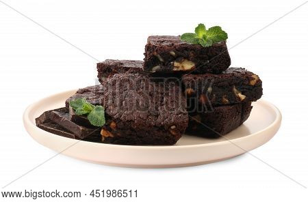 Delicious Chocolate Brownies With Nuts And Fresh Mint On White Background