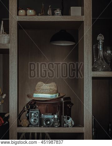 Wooden Shelves Displaying Vintage Style Collectibles Have Hourglass, Retro Pocket Watch, Binocular, 