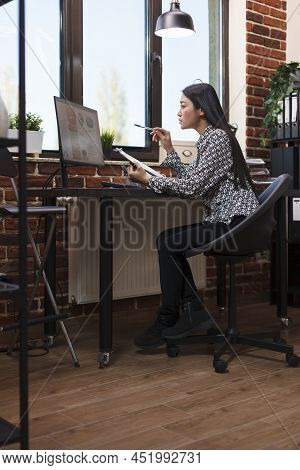 Marketing Company Project Manager Researching Business Viable Partnerships Regarding Collaboration. 