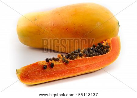 Papaya Fruit Sliced On Half Isolated On A White Background.