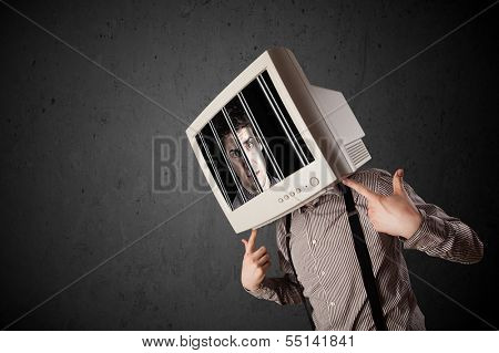 Business man with monitor screen on his head traped into a digital system concept