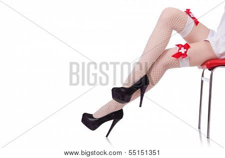 Woman legs in medical sexy fishnet stockings