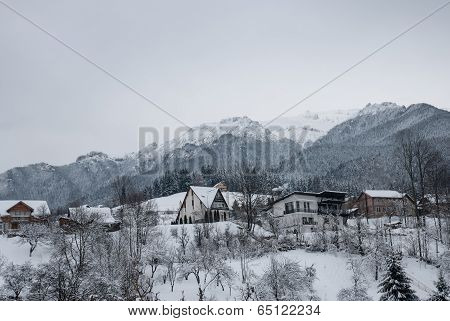 Winter landscape. Mountain village in the Bran,Romanian Carpathians