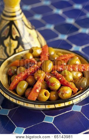 Moroccan hot harissa olives in a tagine