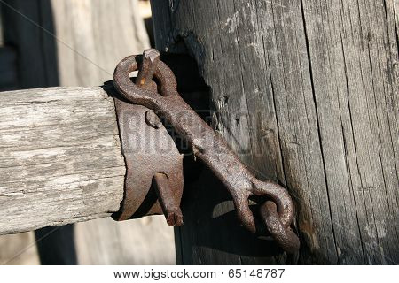 Old metal part on the fence