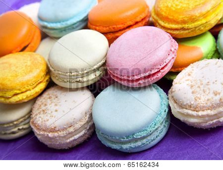 Colorful fresh makarons Cake on a plate