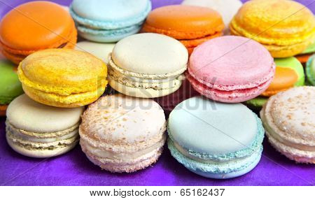 Colorful fresh makarons Cake on a plate